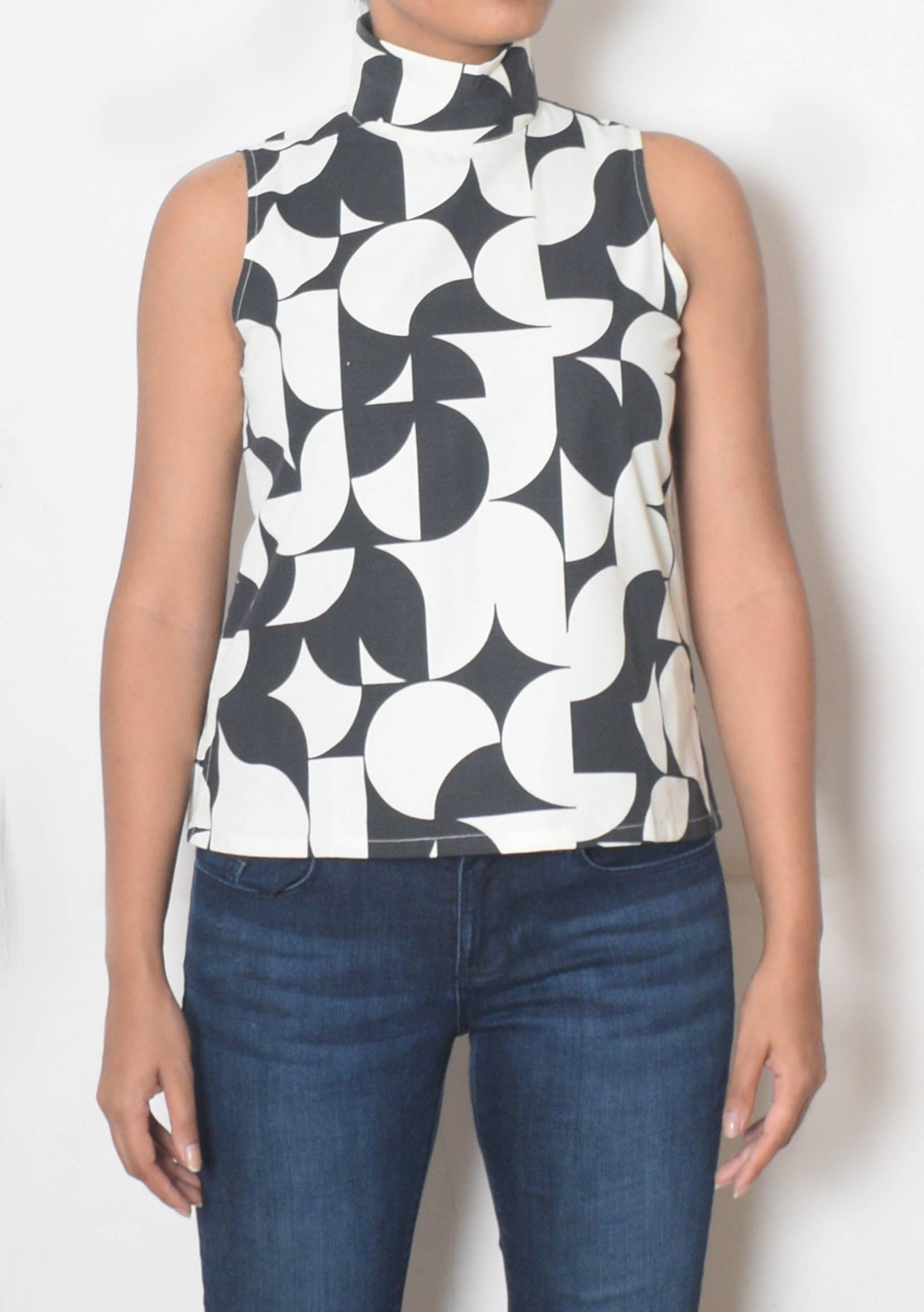 THEA ~ Mock high neck top with belt ~ white with black circles